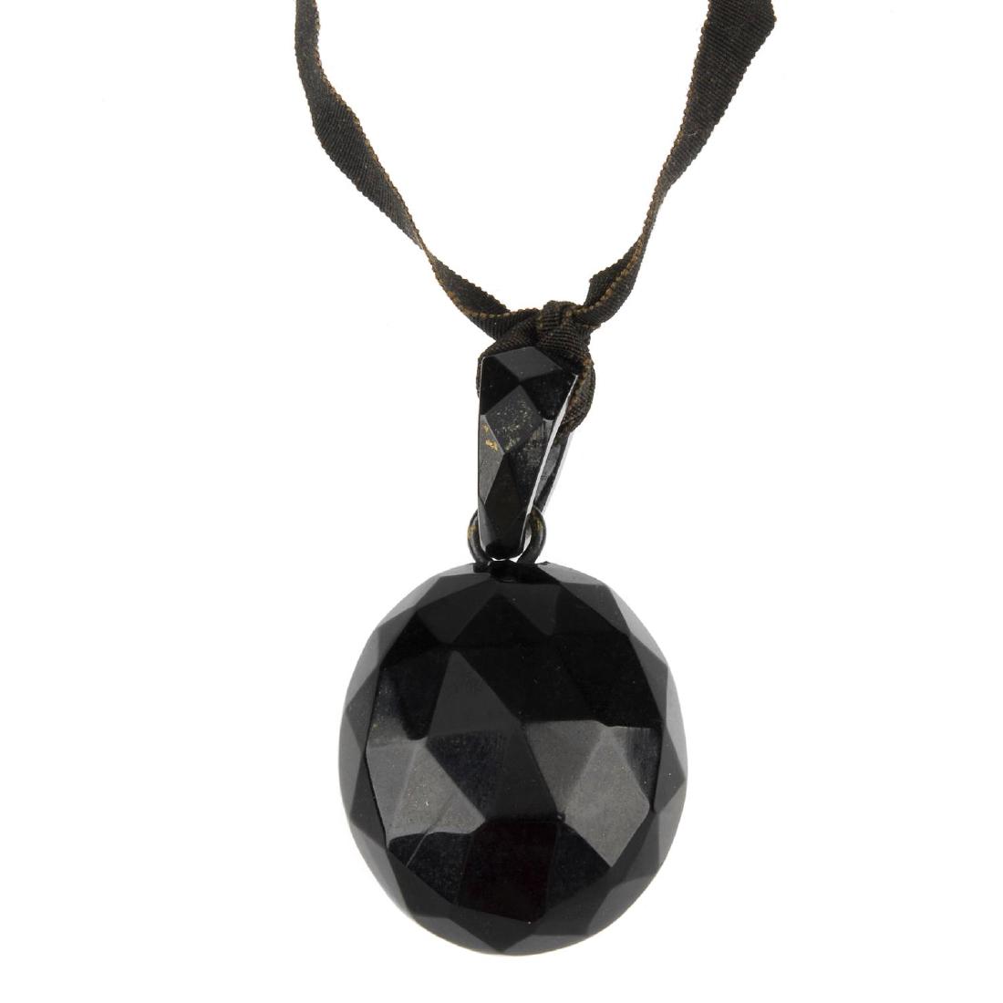 A selection of jet jewellery and pieces. To include a (1 of 3)