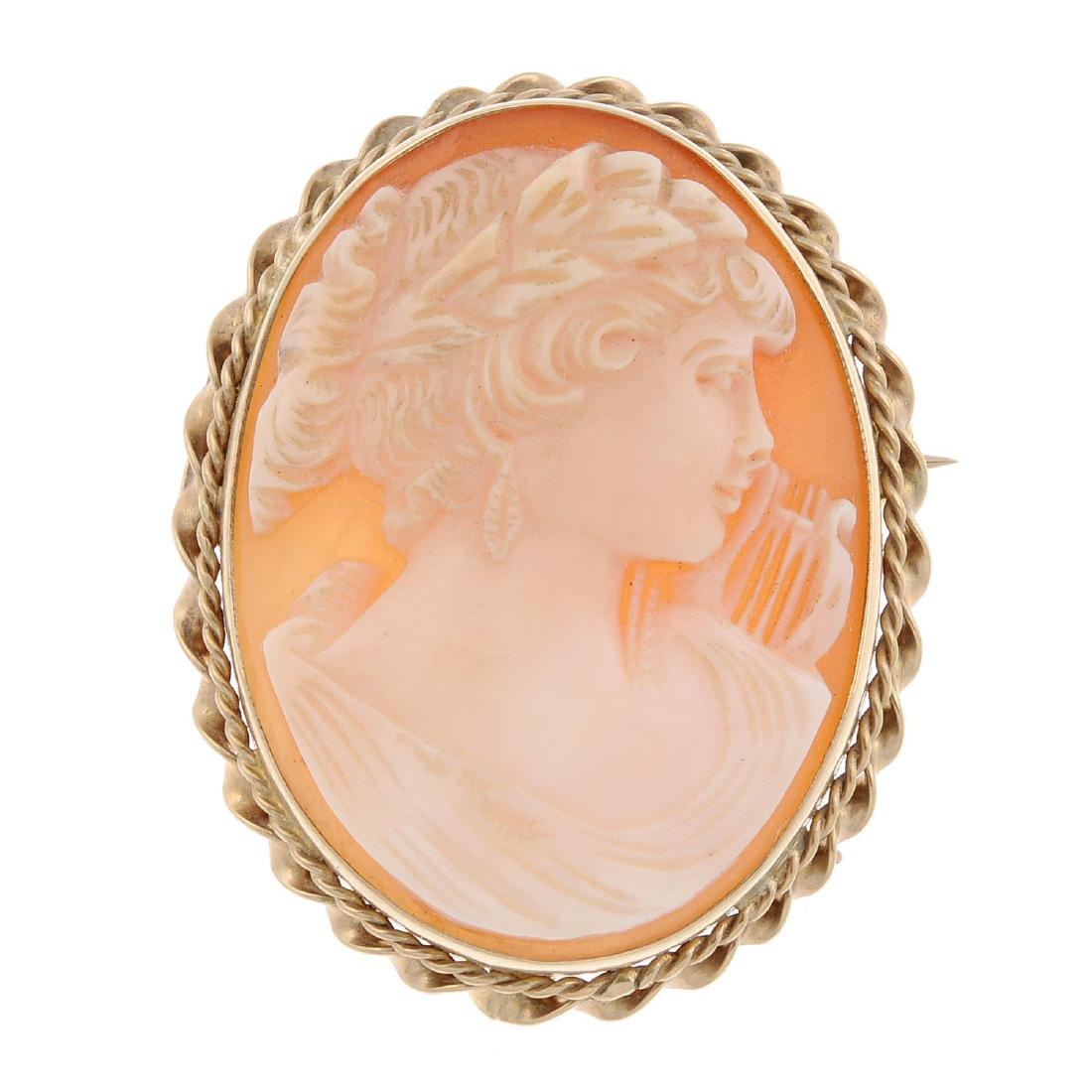 A 9ct gold cameo brooch. Of oval outline, the shell (1 of 2)