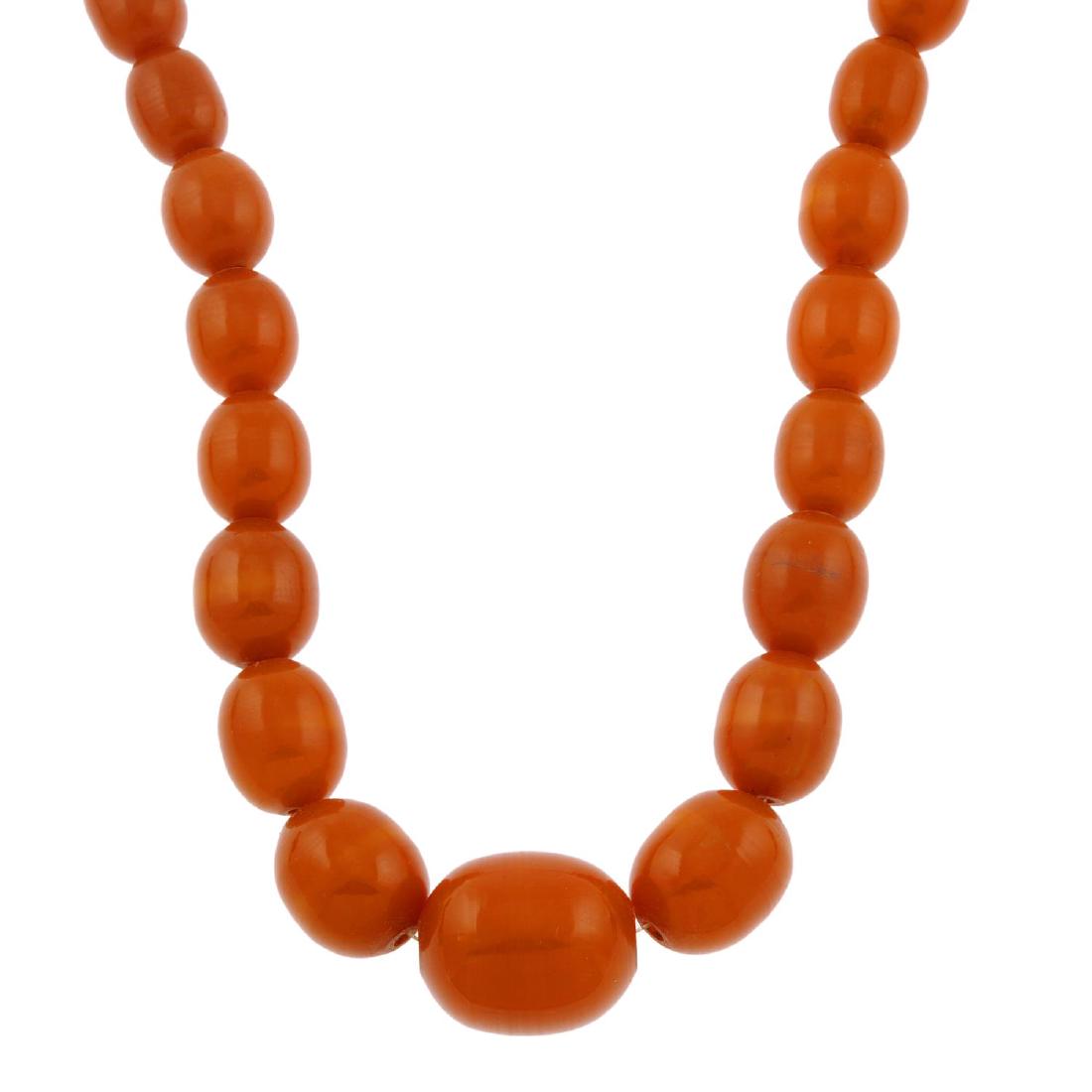 A reconstructed amber necklace and a selection of (1 of 8)