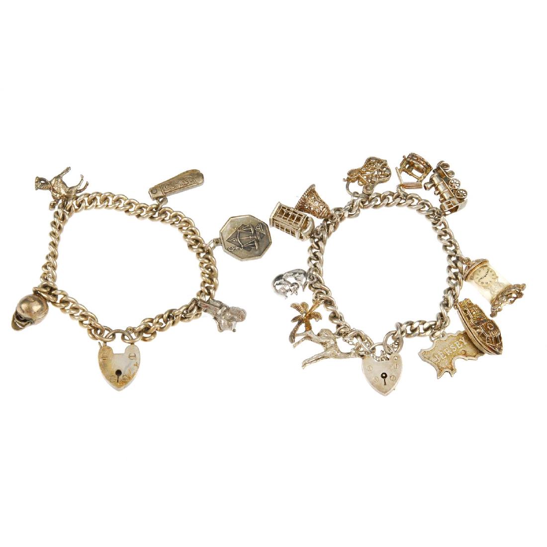 Four charm bracelets. Two with curb-link bracelets, one (1 of 2)