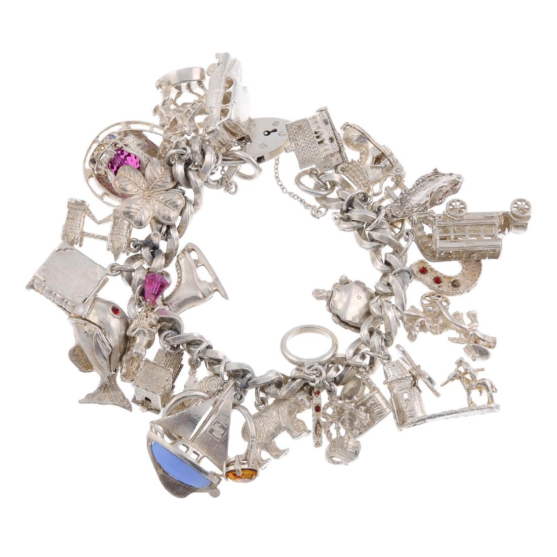 A charm bracelet and a bracelet. Both designed as (1 of 4)