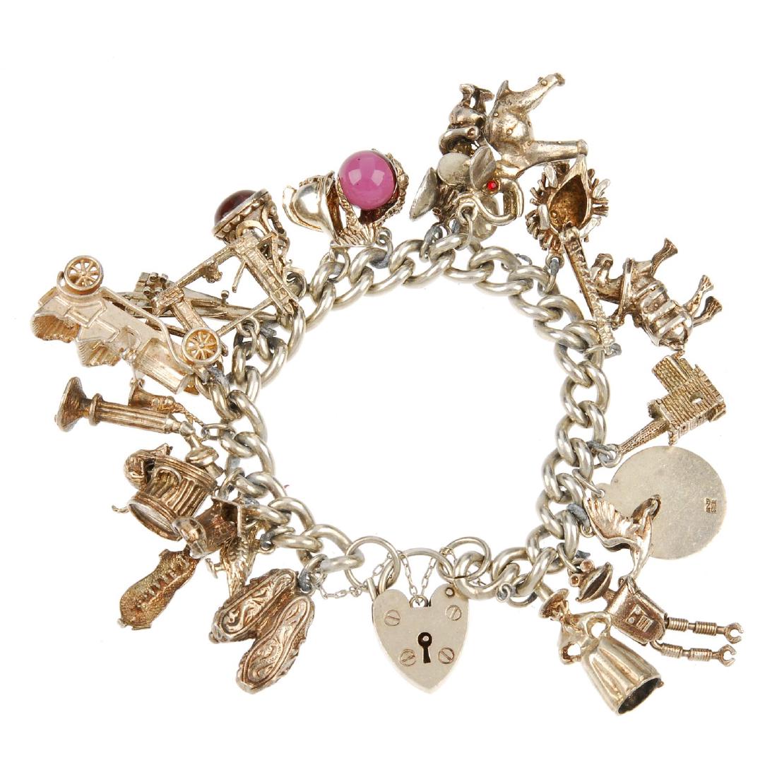 Three charm bracelets. Two with curb-link bracelets and (1 of 2)