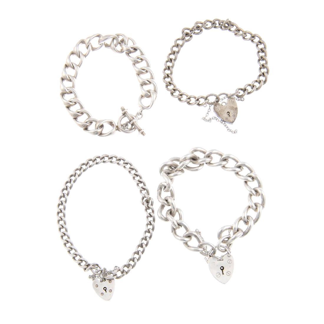 Four bracelets. All of slightly varying curb-link (1 of 2)