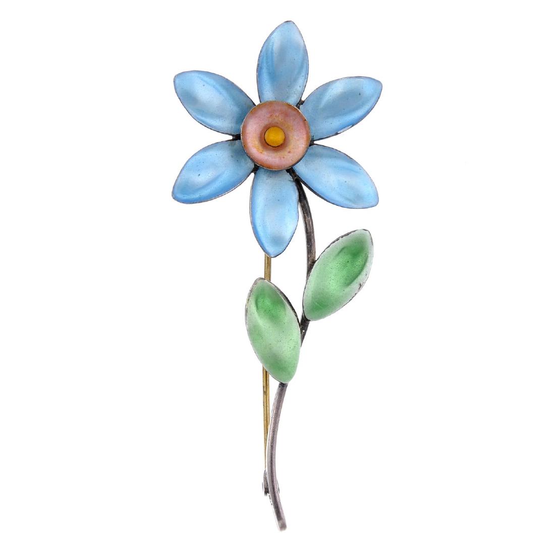 Seven items of silver and white metal jewellery. To: Seven items of silver and white metal jewellery. To include a Bernard Instone enamel flower brooch, a Mexican hinged bangle set with an oval amethyst, a citrine brooch and four further brooches. Lengt