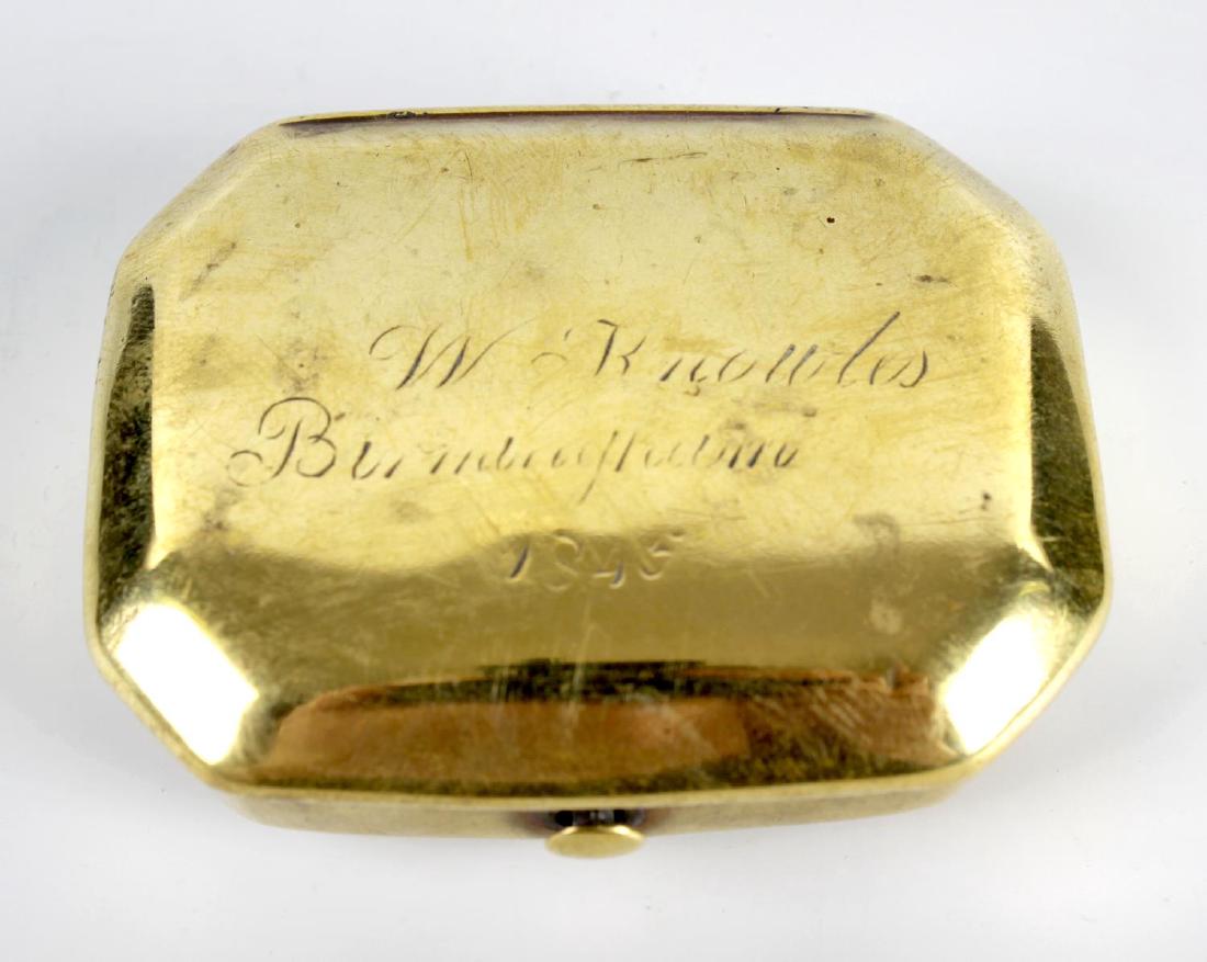 A 19th century brass snuff box and hinged cover, of: A 19th century brass snuff box and hinged cover, of rectangular shaped form with canted corners, engraved to cover W Knowles Birmingham 1845, and engraved to underside of base G Topham, 2.5 (6.25cm) w