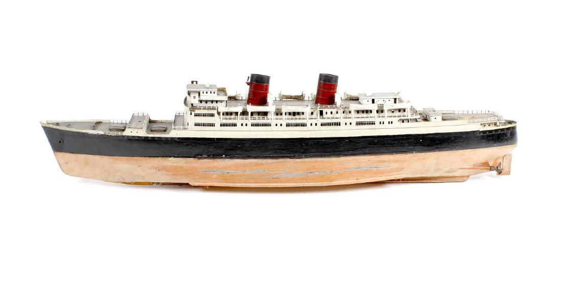 An early 20th century model steamship. The: An early 20th century model steamship. The wooden-hulled live steam boat T. S. S. Awatea, with removable deck, the detailed superstructure with metal funnels, life boats and other fittings, enclosing 