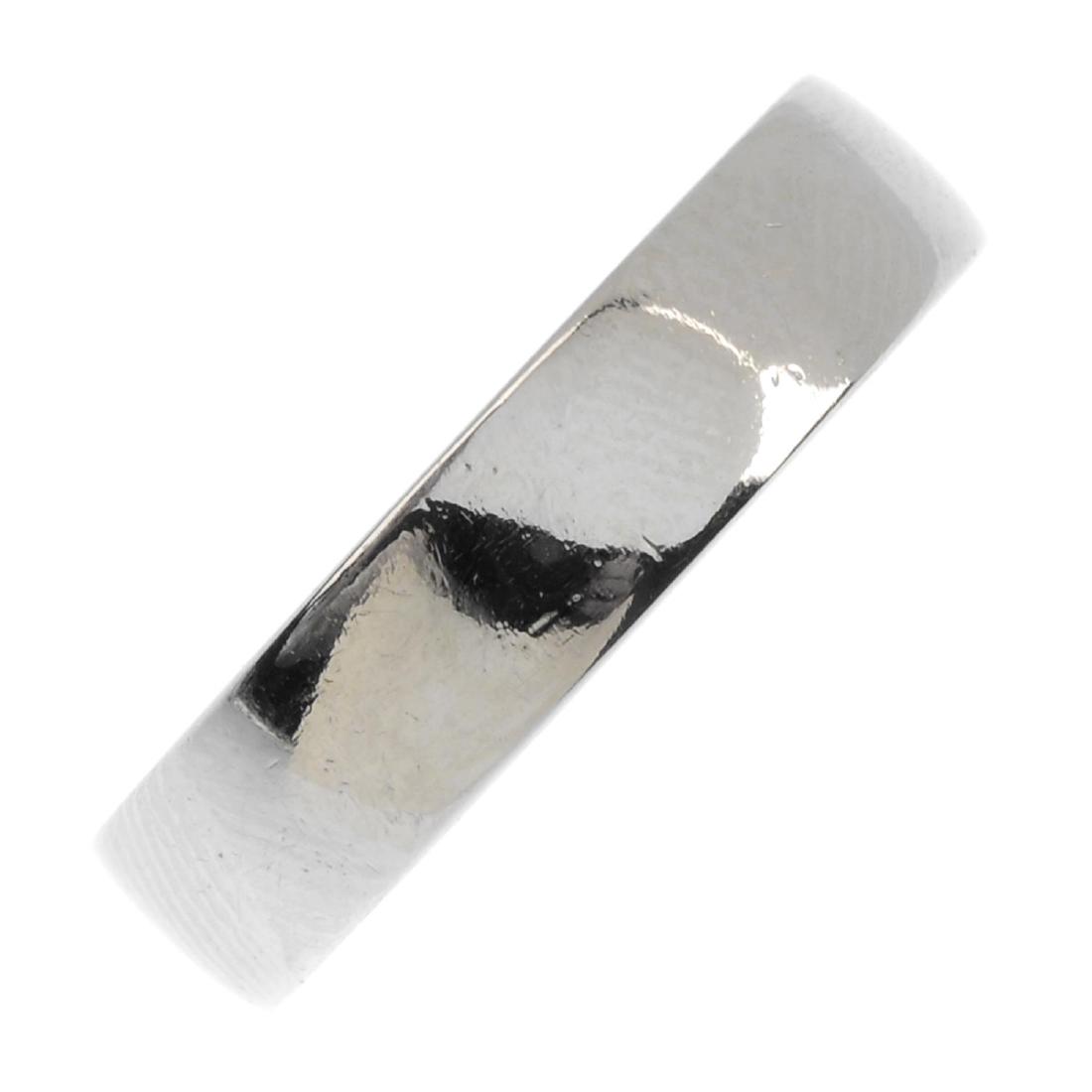 DE BEERS - a platinum band ring. The polished band, (1 of 3)