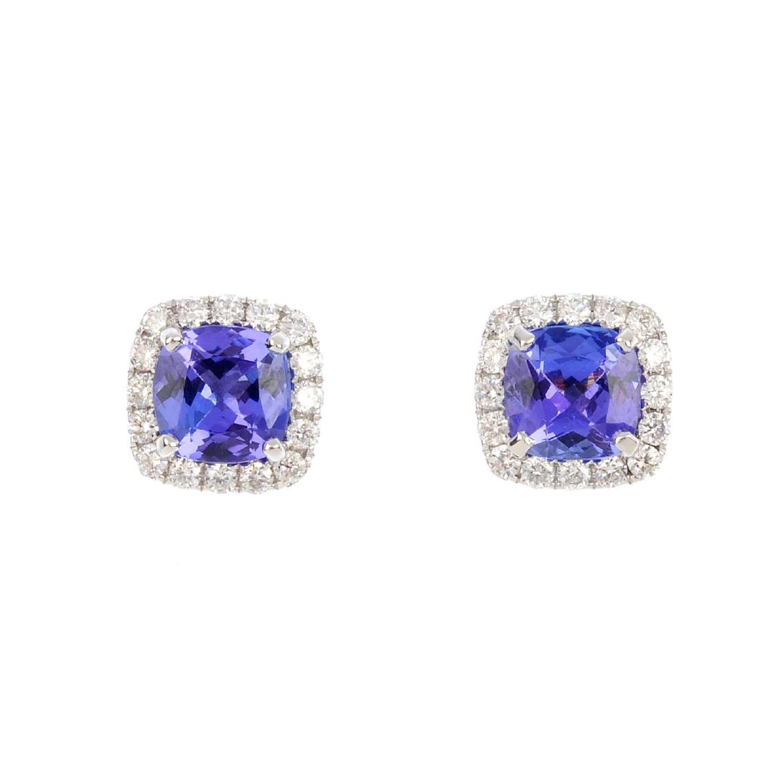 A pair of tanzanite and diamond cluster earrings. Each (1 of 2)