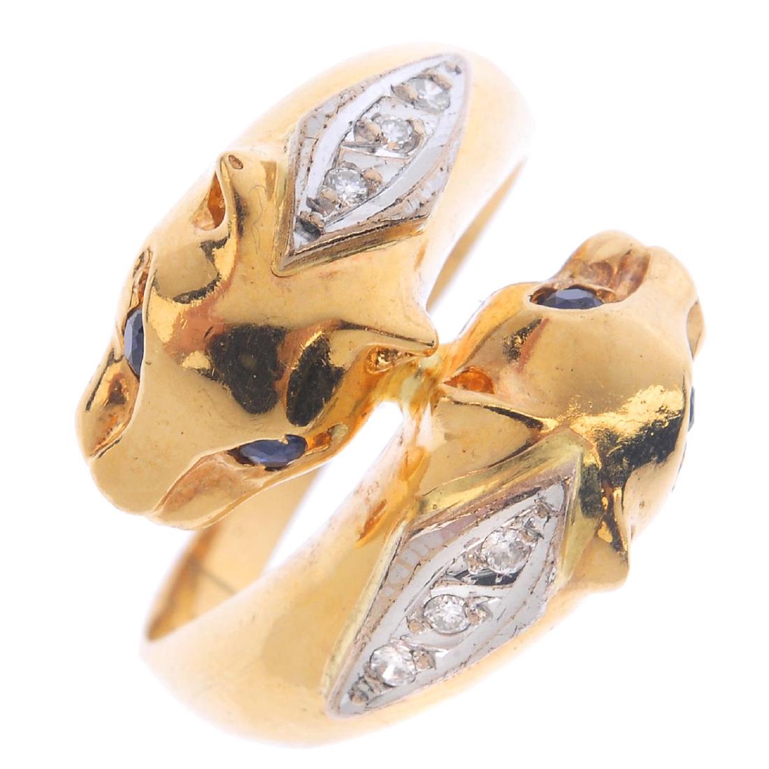 An 18ct gold diamond and sapphire panther ring. (1 of 3)