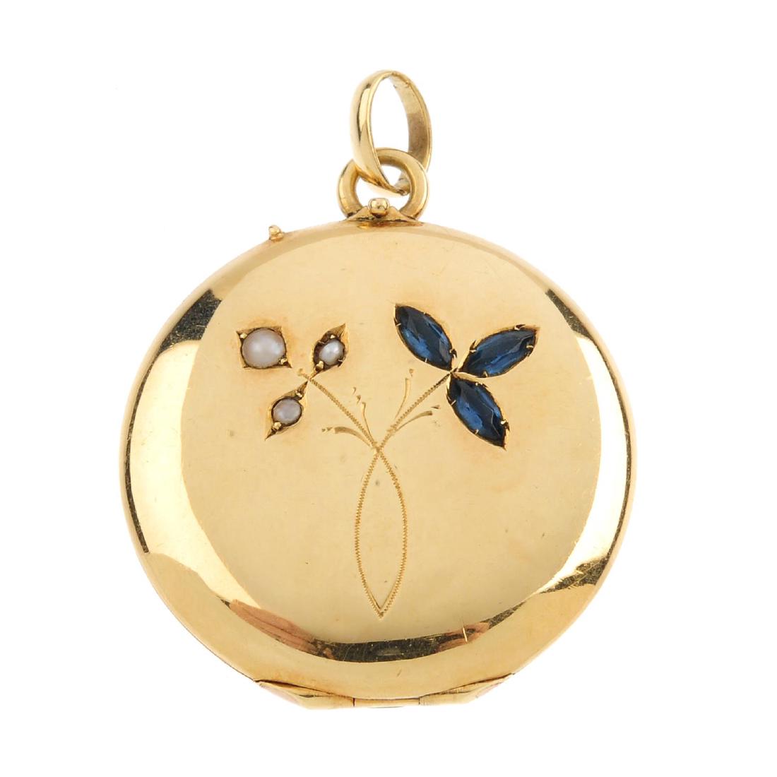 An early 20th century gold split-pearl and sapphire (1 of 2)