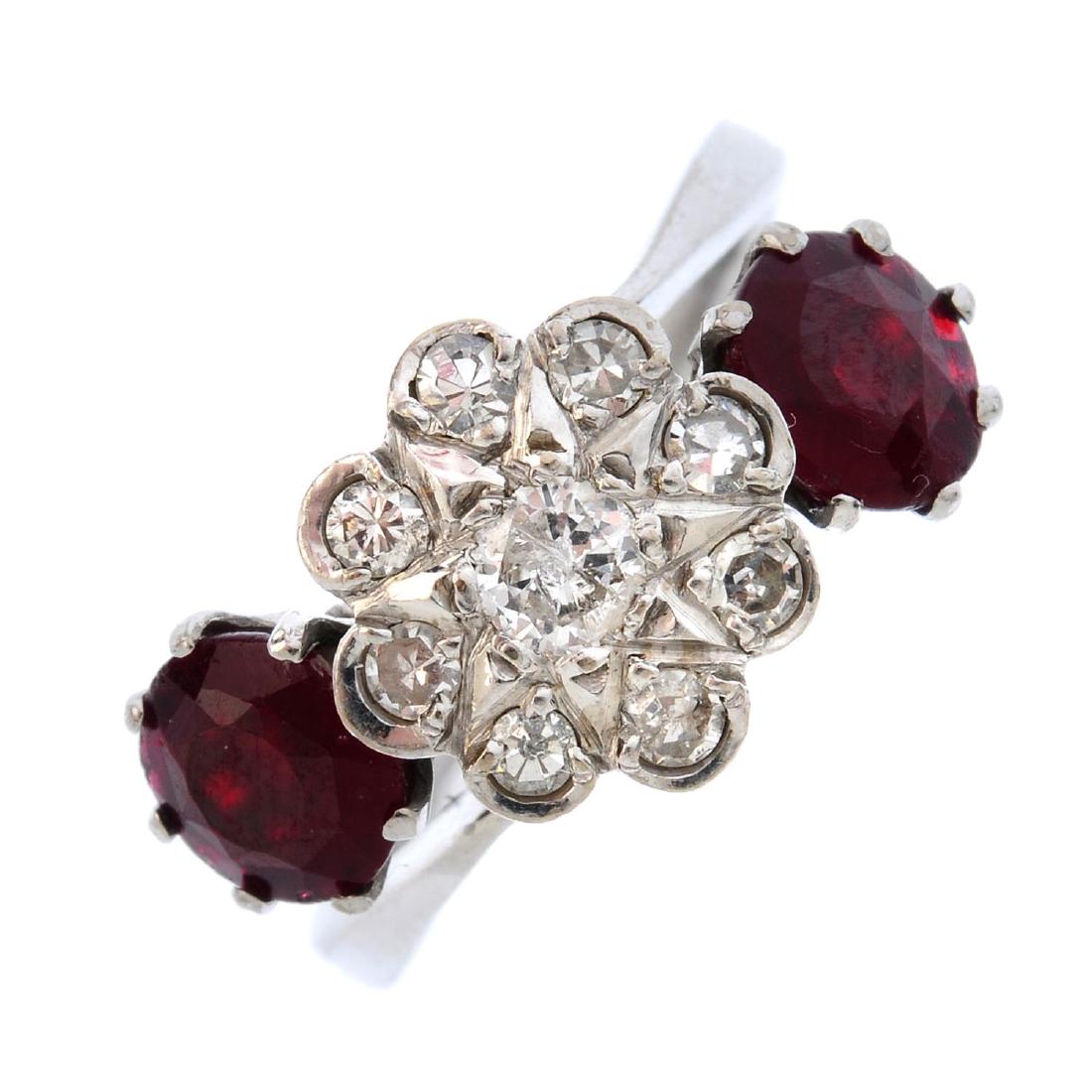 A diamond and garnet-topped-doublet crossover ring. The (1 of 3)