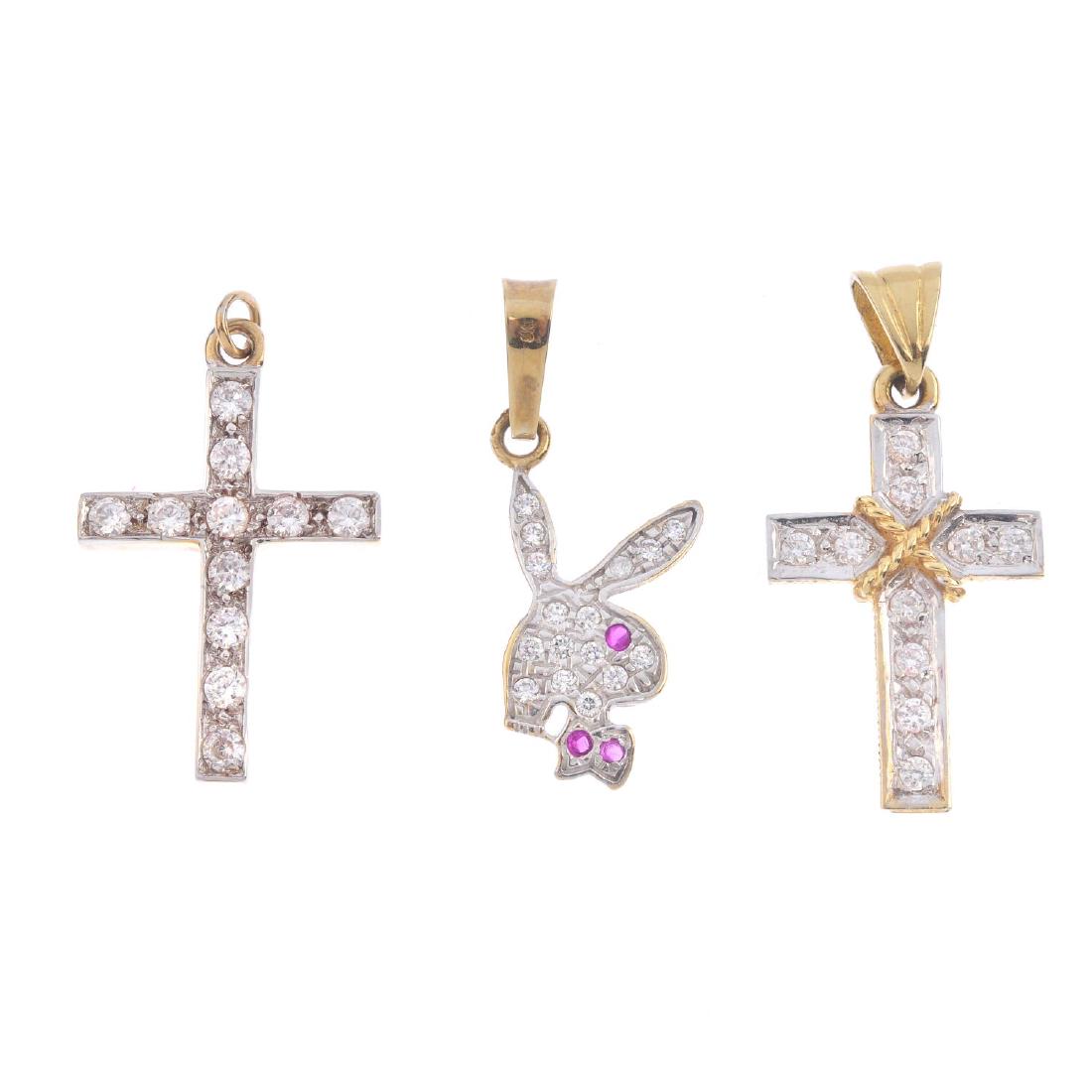 Three cubic zirconia pendants. To include a rabbit (1 of 2)