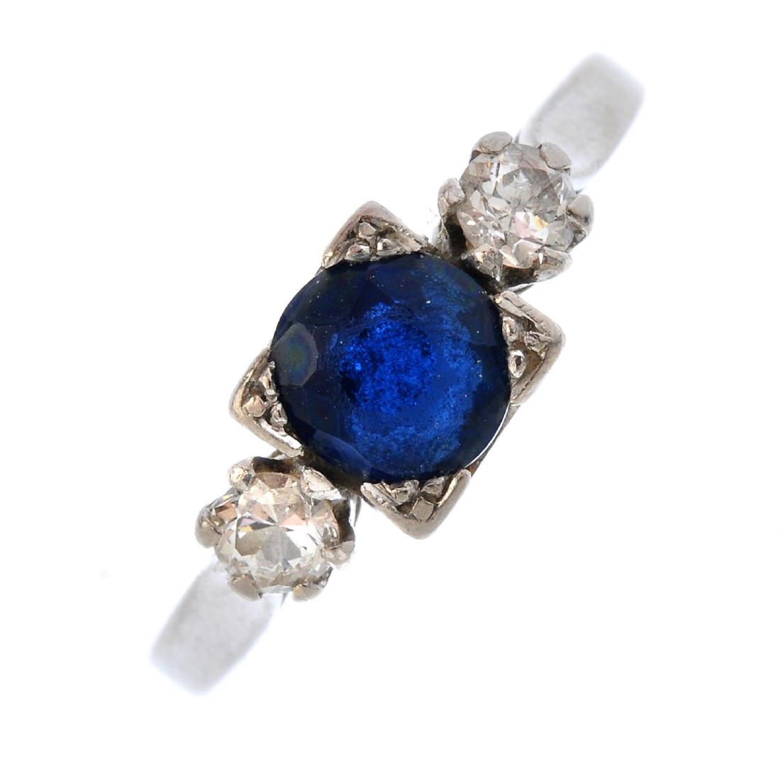 A diamond and paste three-stone ring. The (1 of 3)