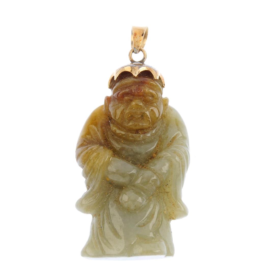 A jade figural pendant. Carved to depict a bearded man (1 of 2)