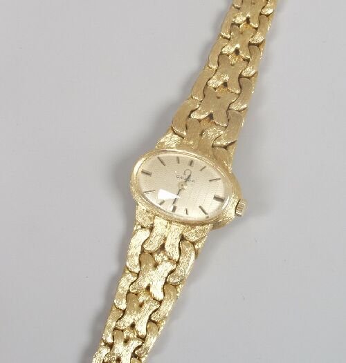 OMEGA - a lady's 1960's 18ct gold watch