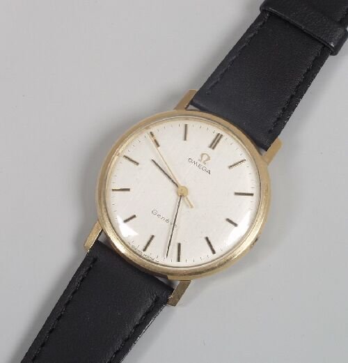 OMEGA - a gentleman's 9ct gold Geneve s