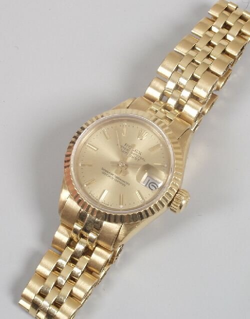 ROLEX - a lady's 18ct yellow gold Oyst: ROLEX - a lady's 18ct yellow gold Oyster Perpetual Datejust watch with gilt dial and Jubilee bracelet, serial and model numbers worn. Case, dial and movement signed Rolex.
