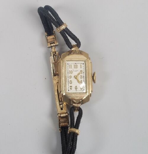 A lady's Art Deco Elgin watch on cordet