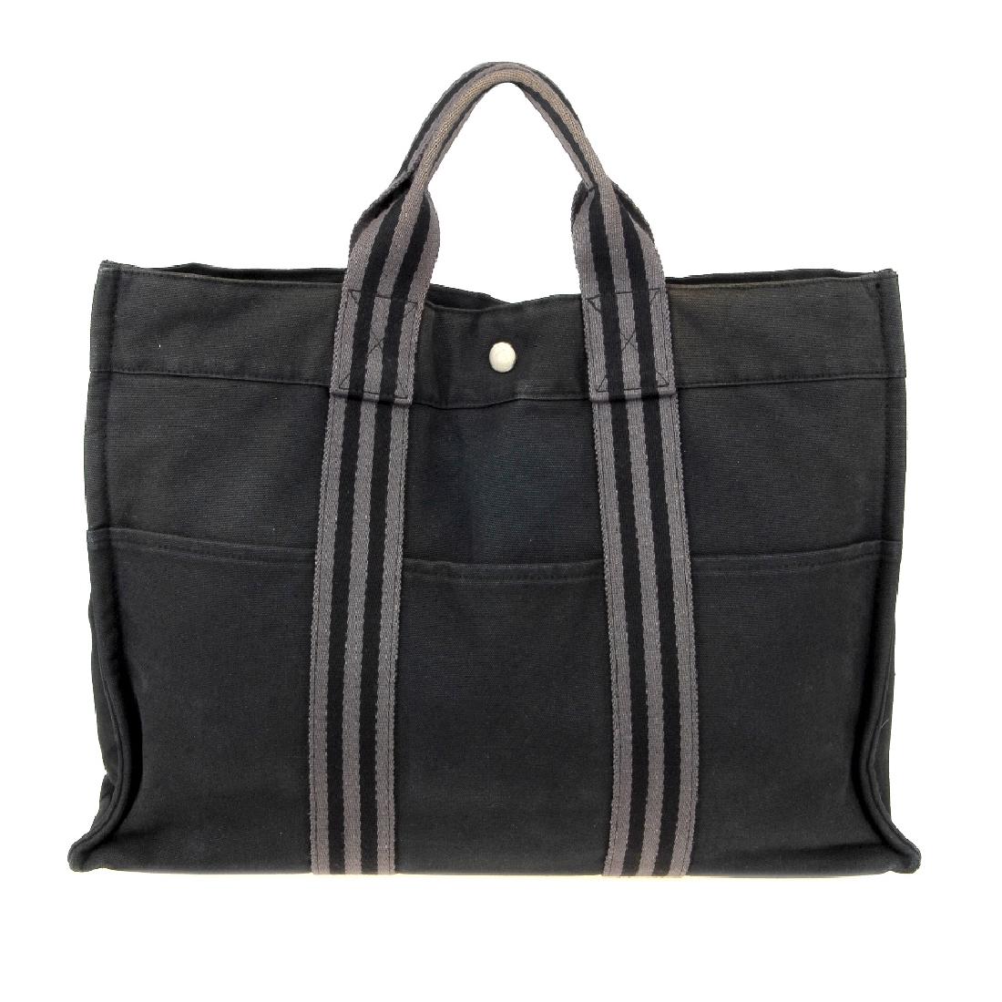 HERMÈS - a Fourre Tout canvas handbag. Designed with a (1 of 7)