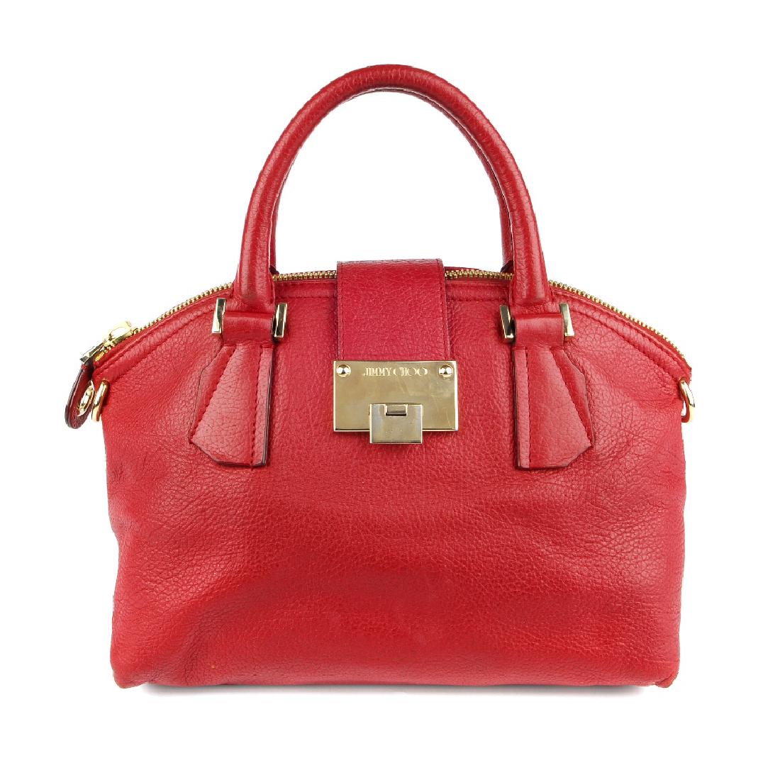 JIMMY CHOO - a red leather handbag. Crafted from supple (1 of 7)