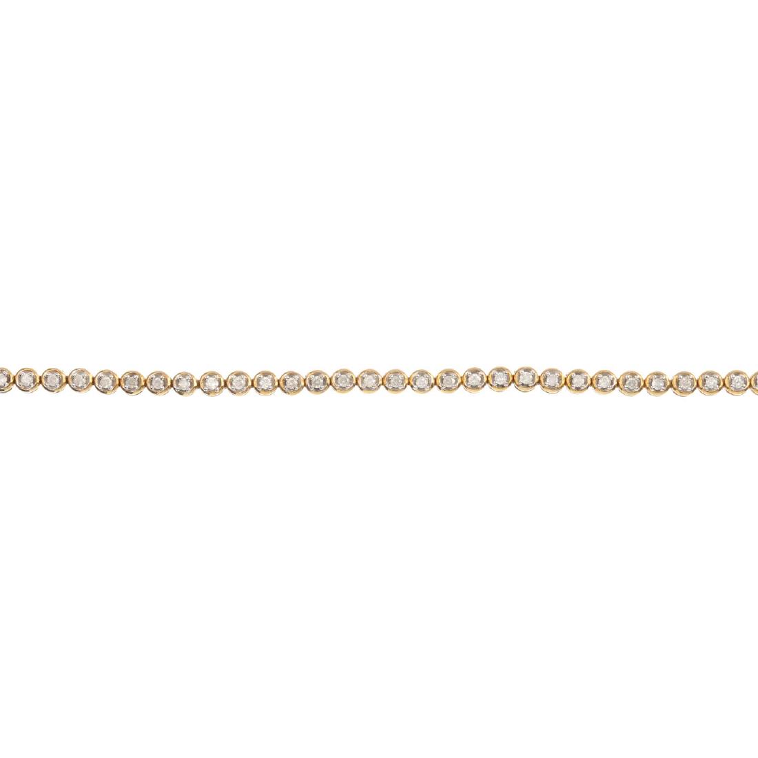 A 9ct gold diamond line bracelet. The brilliant-cut (1 of 3)