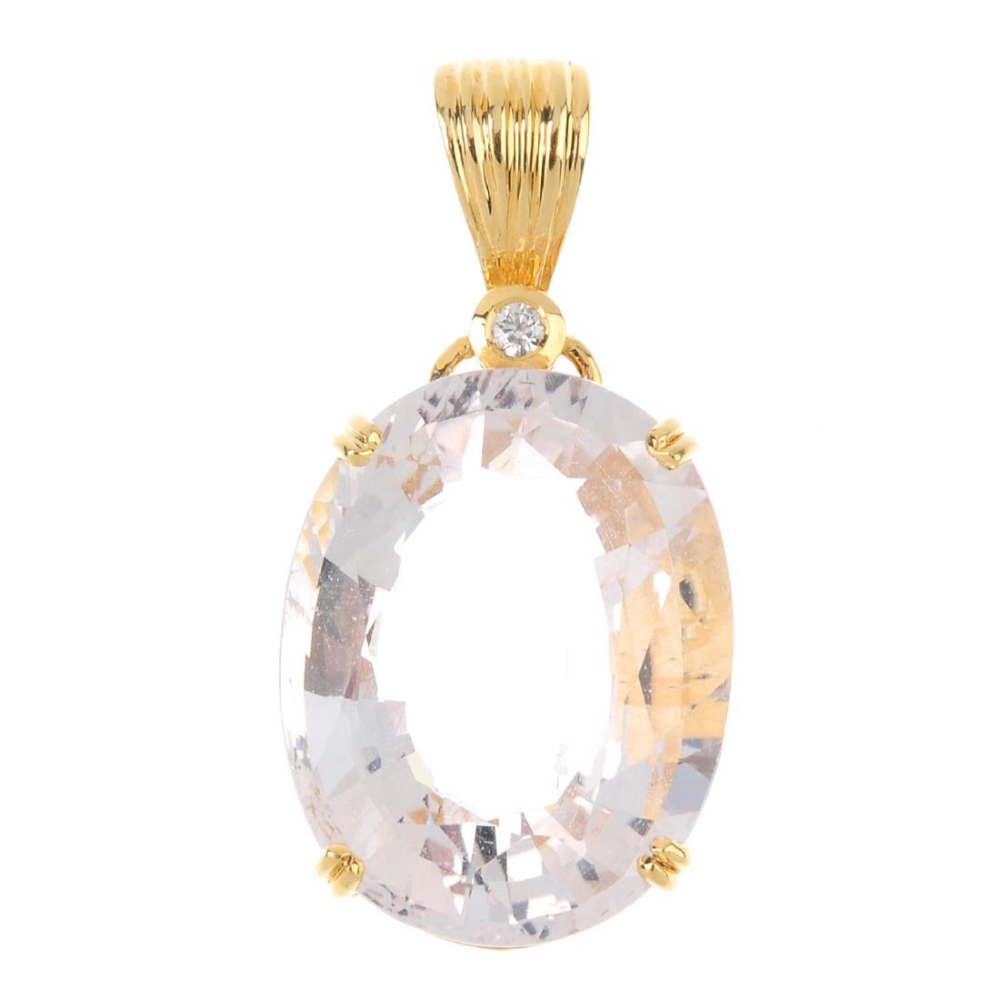 An 18ct gold morganite and diamond pendant. The (1 of 2)