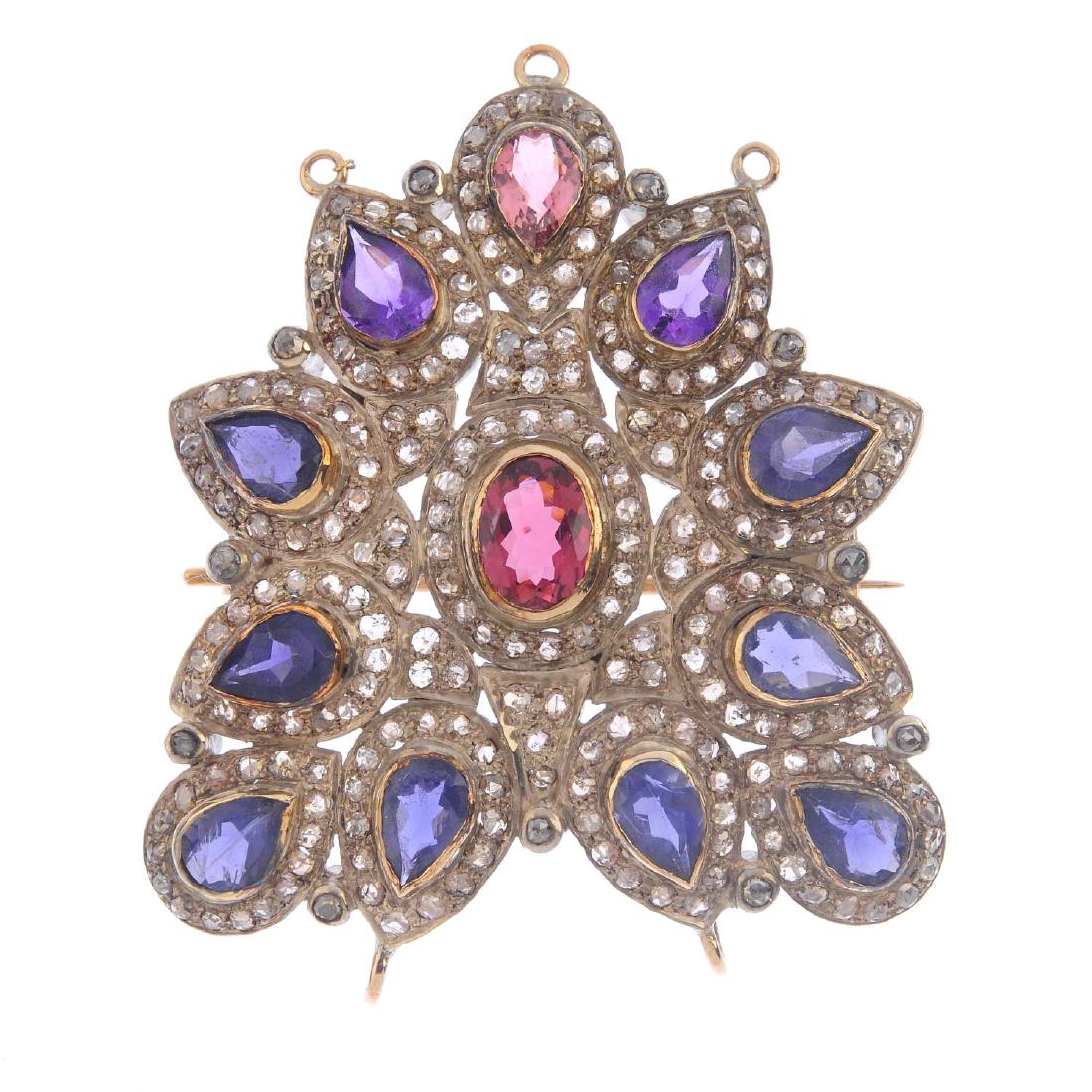 A diamond and gem-set pendant. Of geometric outline, (1 of 2)