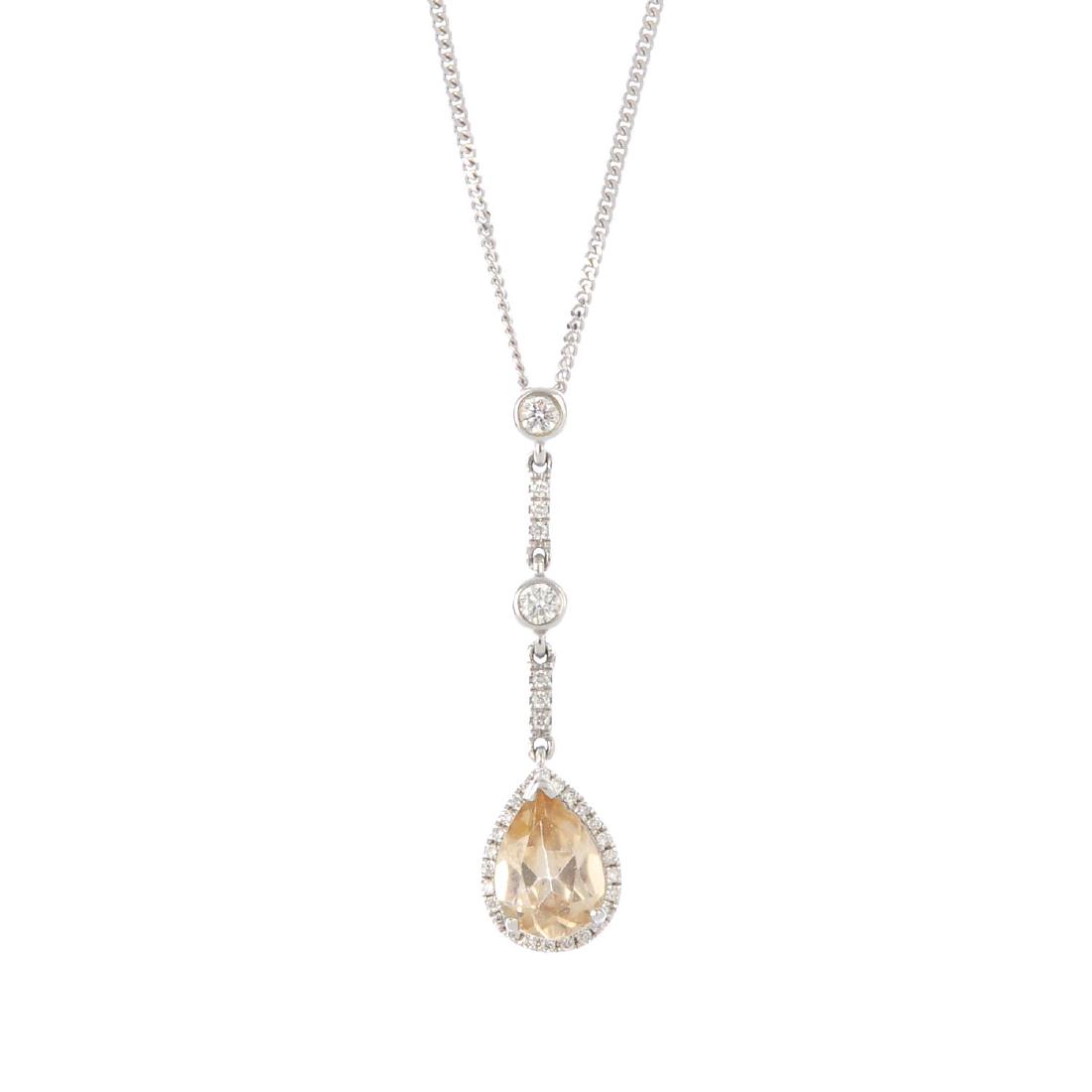 An 18ct gold diamond and gem-set pendant. The (1 of 3)