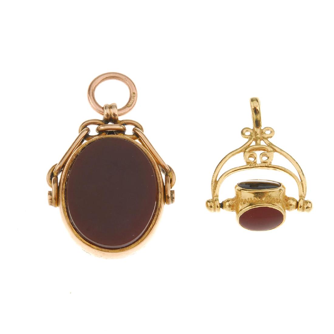 Two 9ct gold swivel fobs. The first designed with (1 of 2)