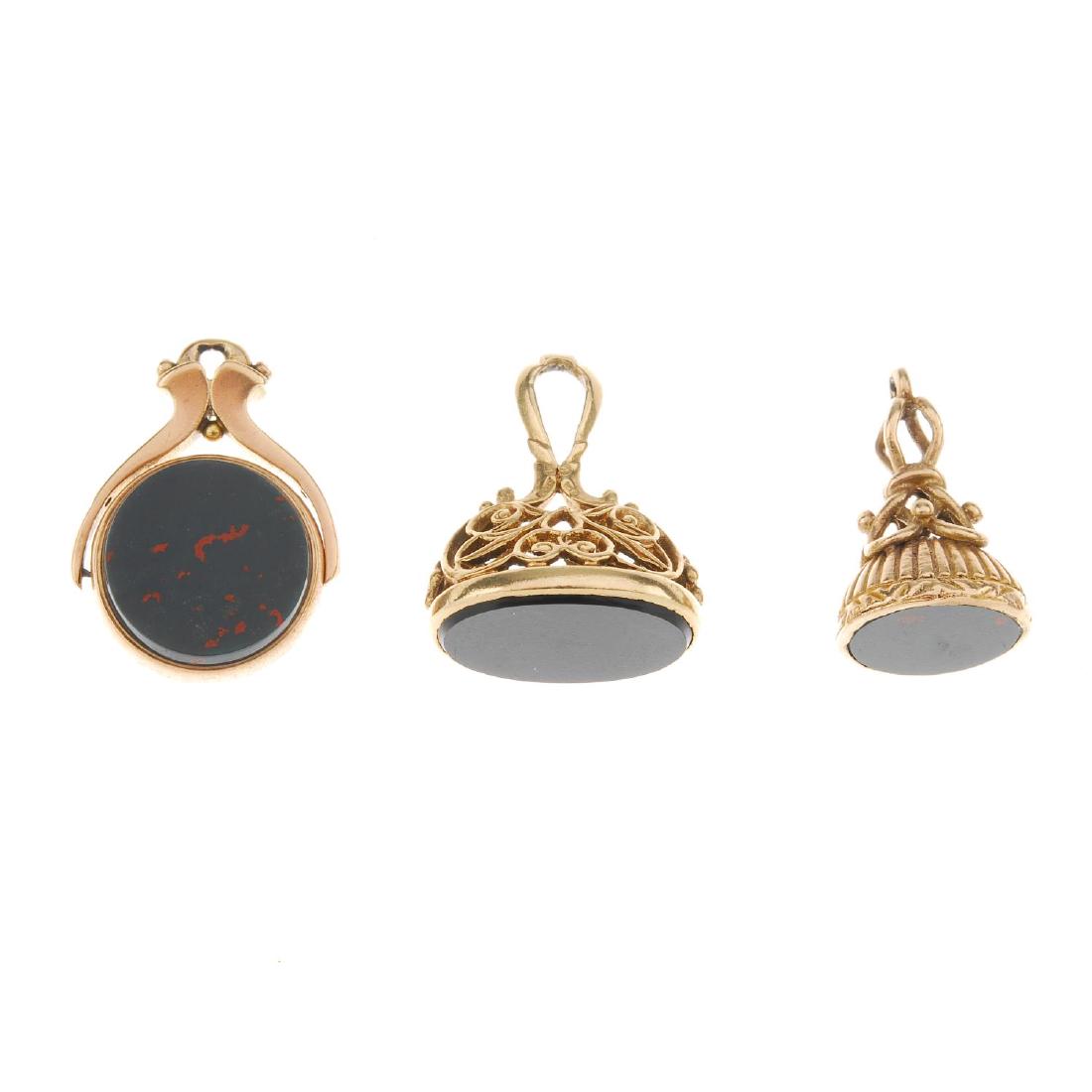 Three fobs. To include a swivel fob with circular (1 of 3)