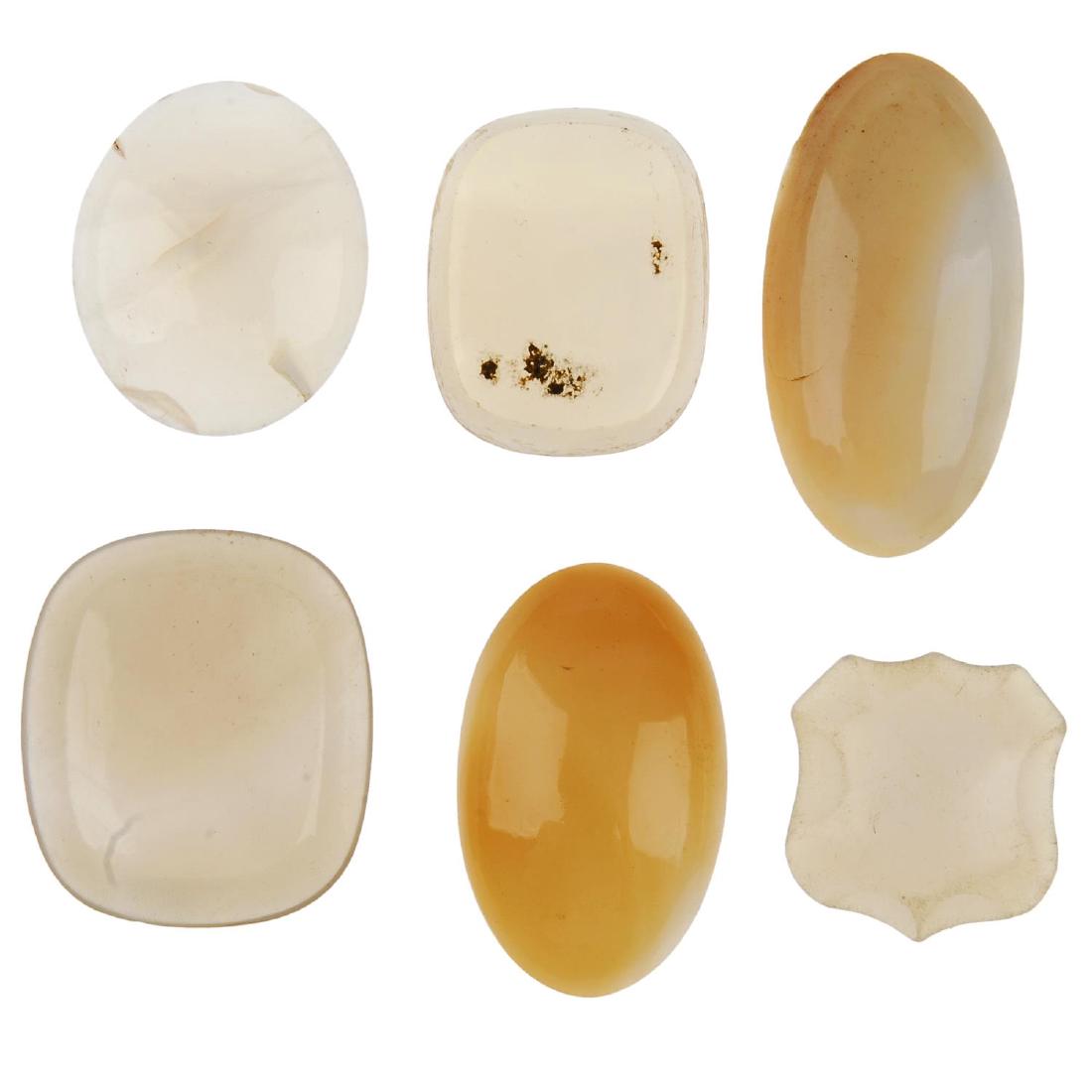 A selection of loose mainly chalcedony panels. Also to: A selection of loose mainly chalcedony panels. Also to include oval and circular cabochons.