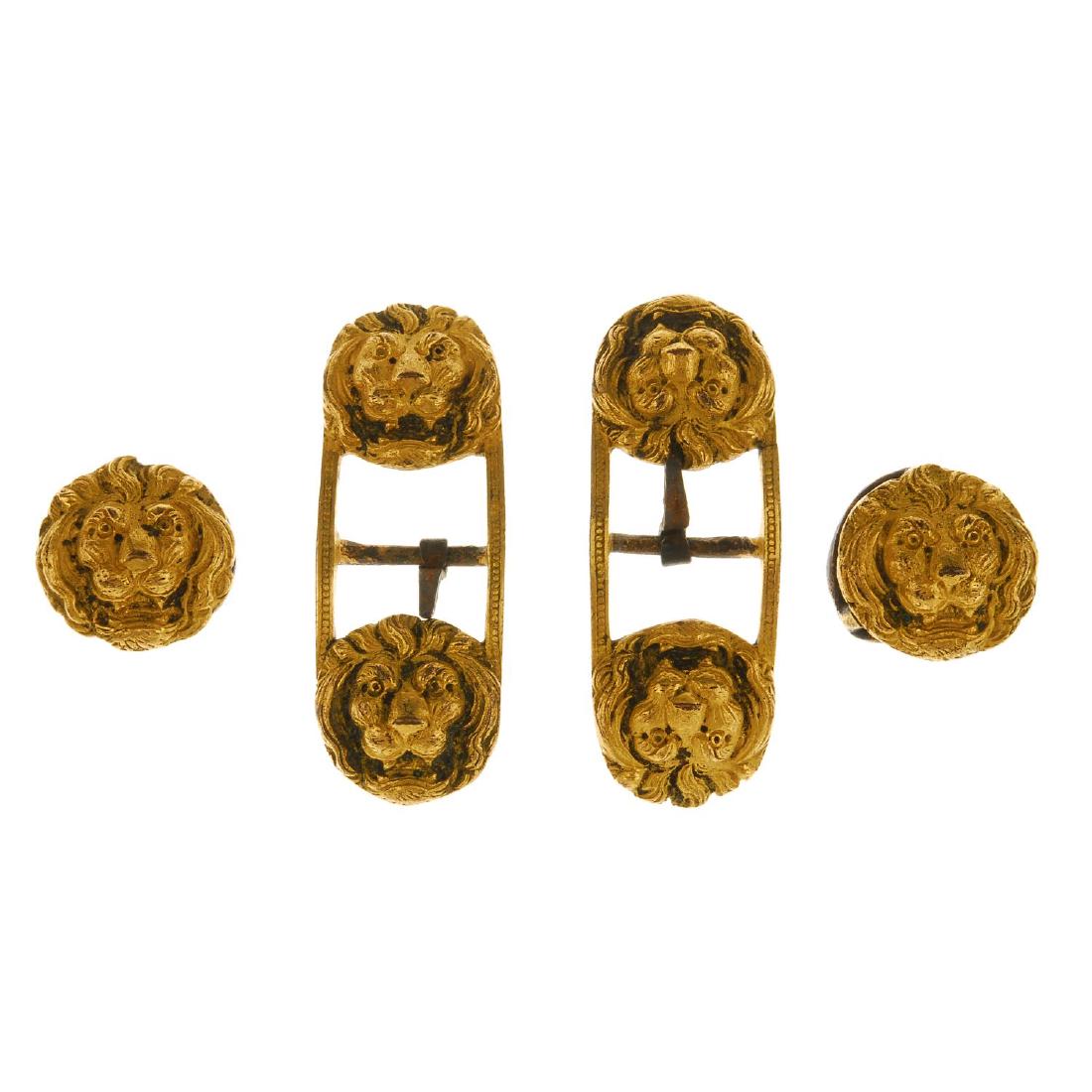 Four lion head buckles. The larger buckles designed as (1 of 2)