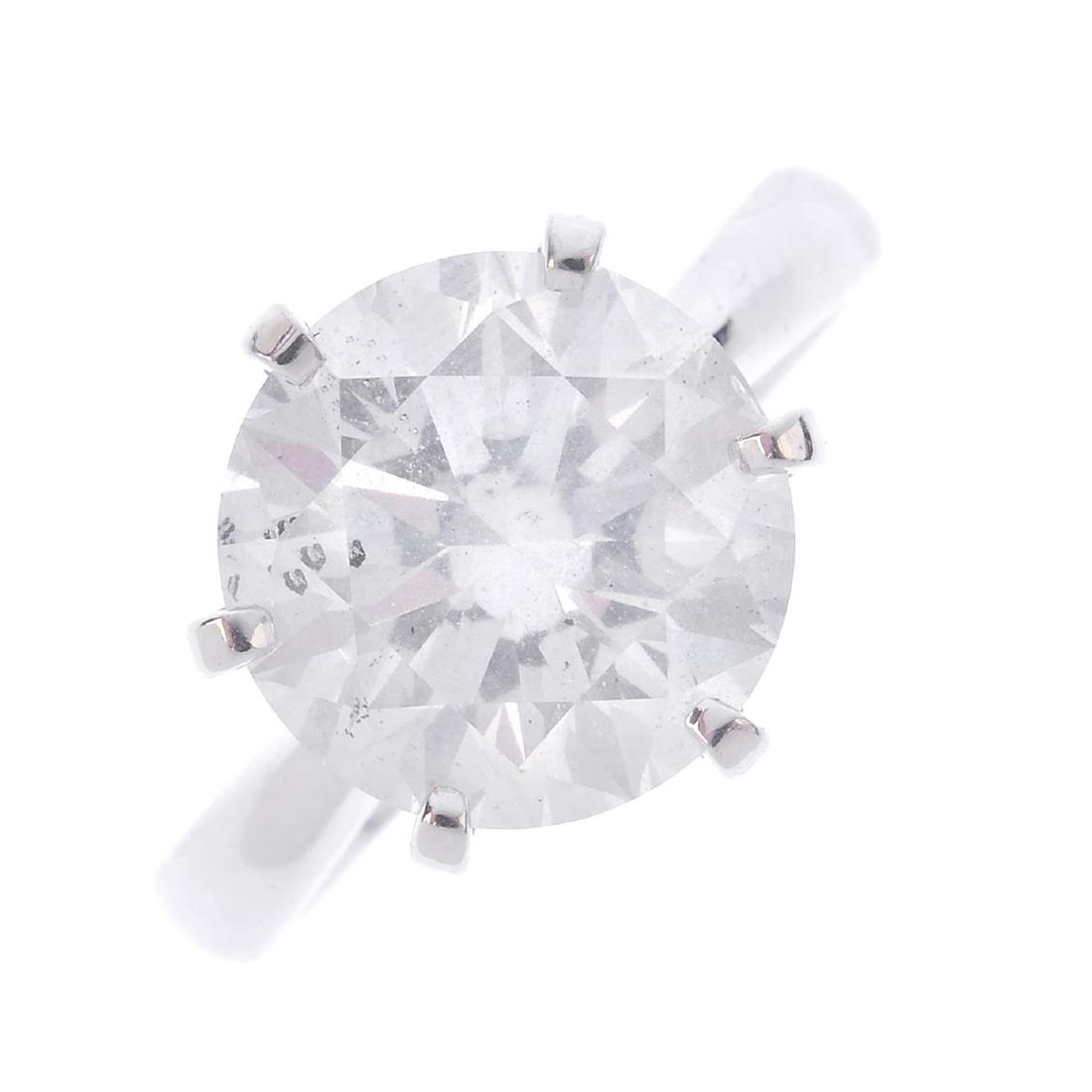 A diamond single-stone ring. The brilliant-cut diamond, (1 of 3)