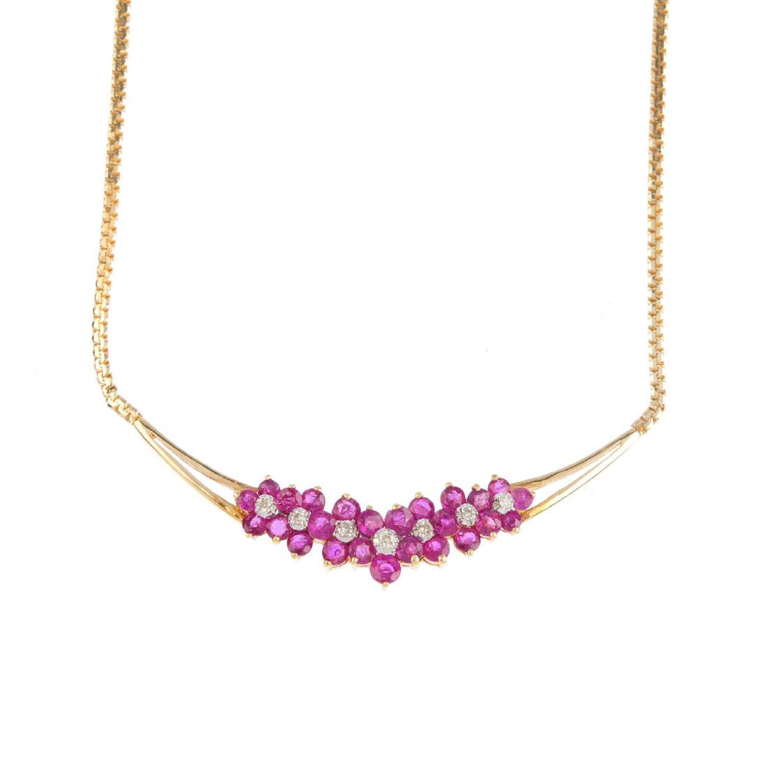 A ruby and diamond necklace. The brilliant-cut diamond (1 of 3)