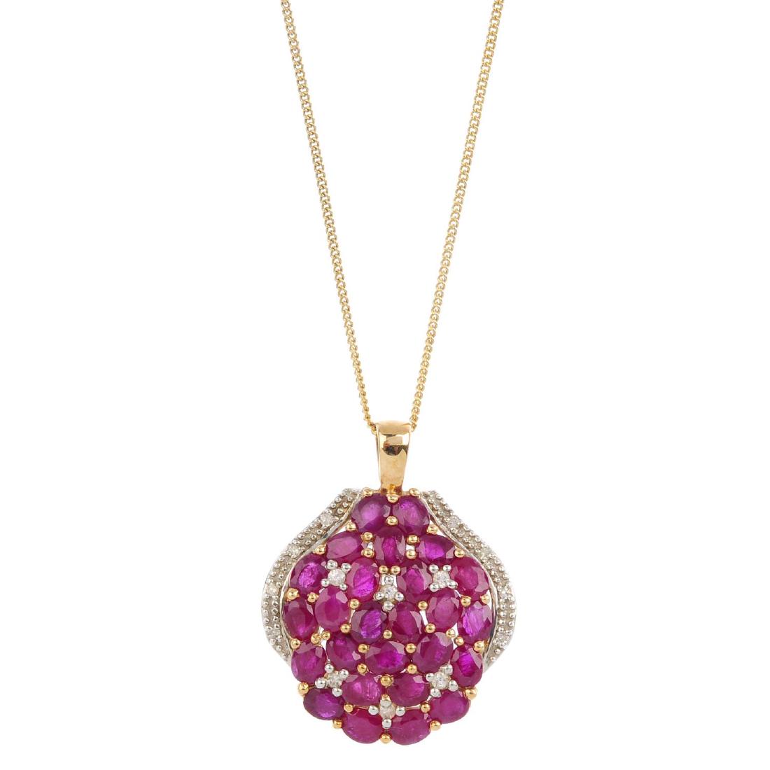 A ruby, cubic zirconia and diamond pendant. Designed as (1 of 4)