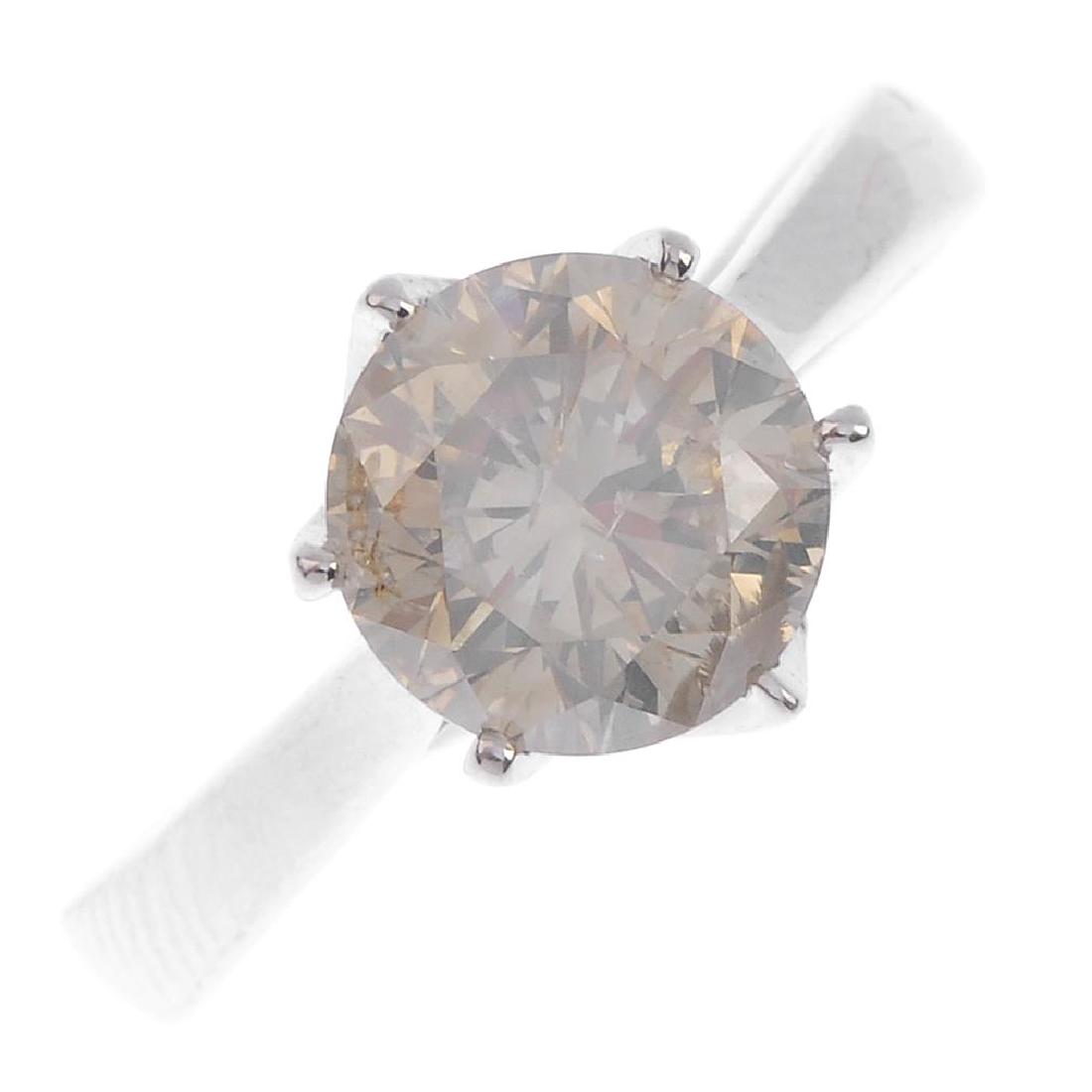 An 18ct gold diamond single-stone ring. The (1 of 3)