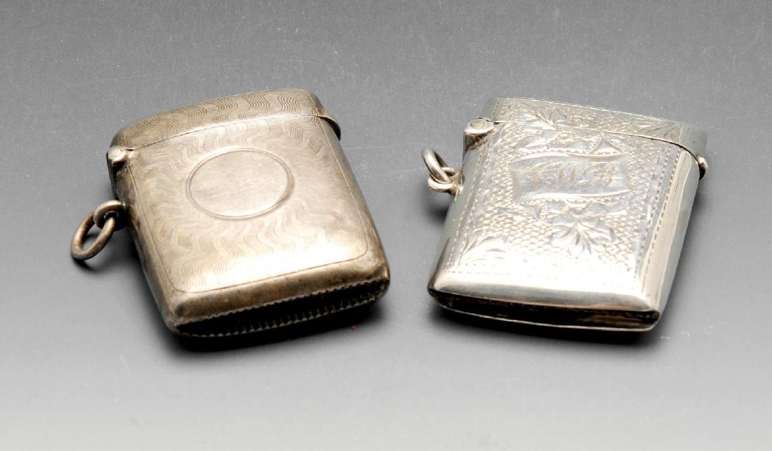 An Edwardian silver vesta case, of oblong form with (1 of 4)