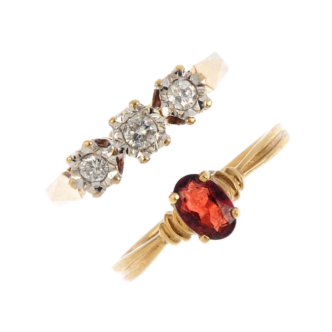 Four 9ct gold diamond and gem-set rings. To include an (1 of 3)