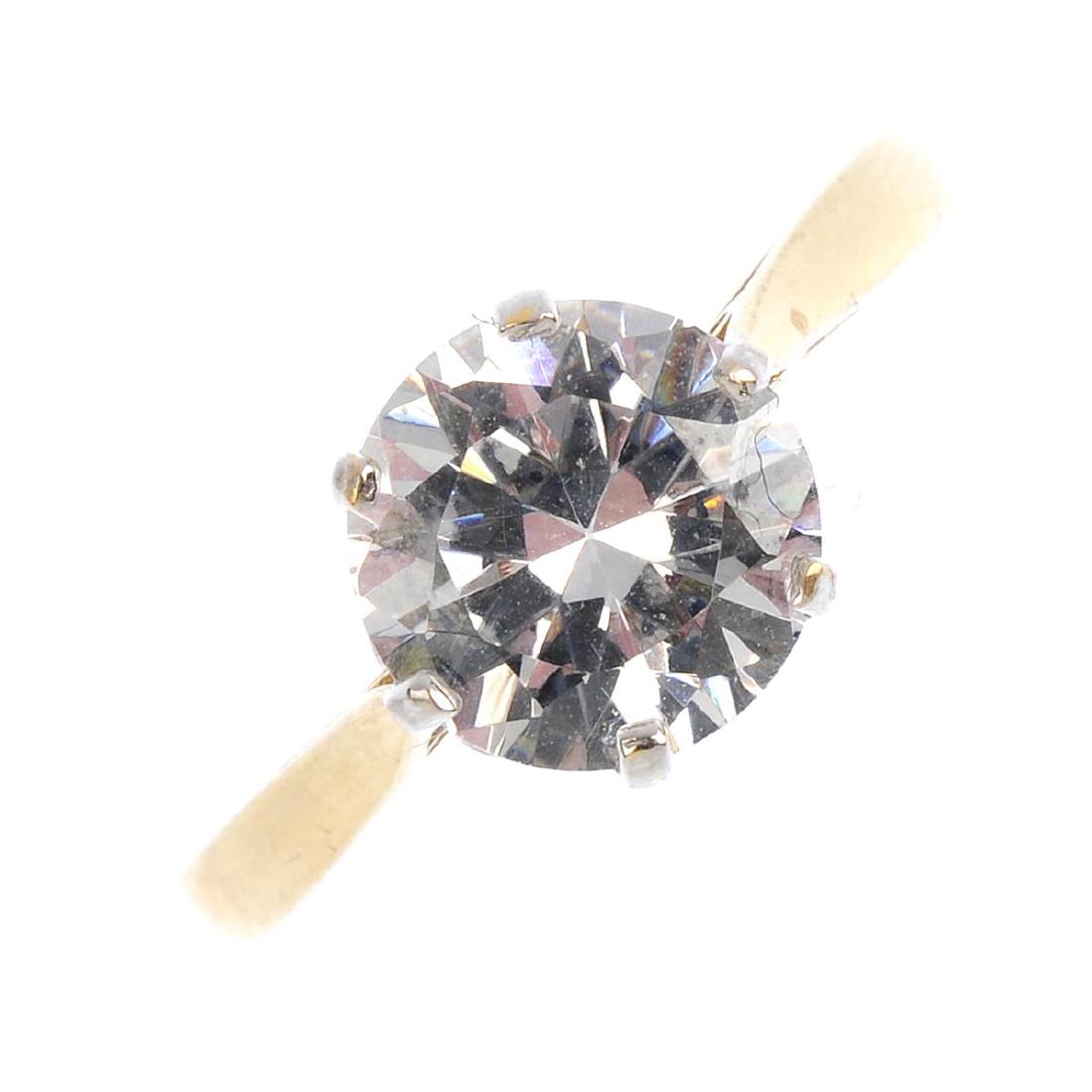 Three 14ct gold gem-set rings. To include a synthetic (1 of 3)