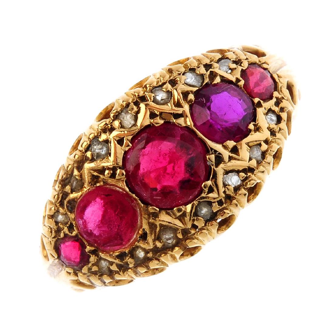 An 18ct gold diamond and gem-set ring. The graduated (1 of 3)