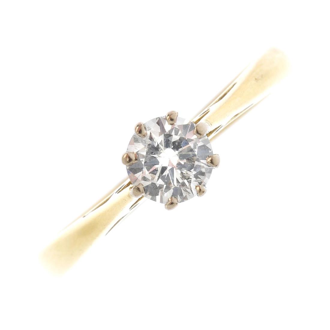 An 18ct gold diamond single-stone ring and a loose (1 of 4)