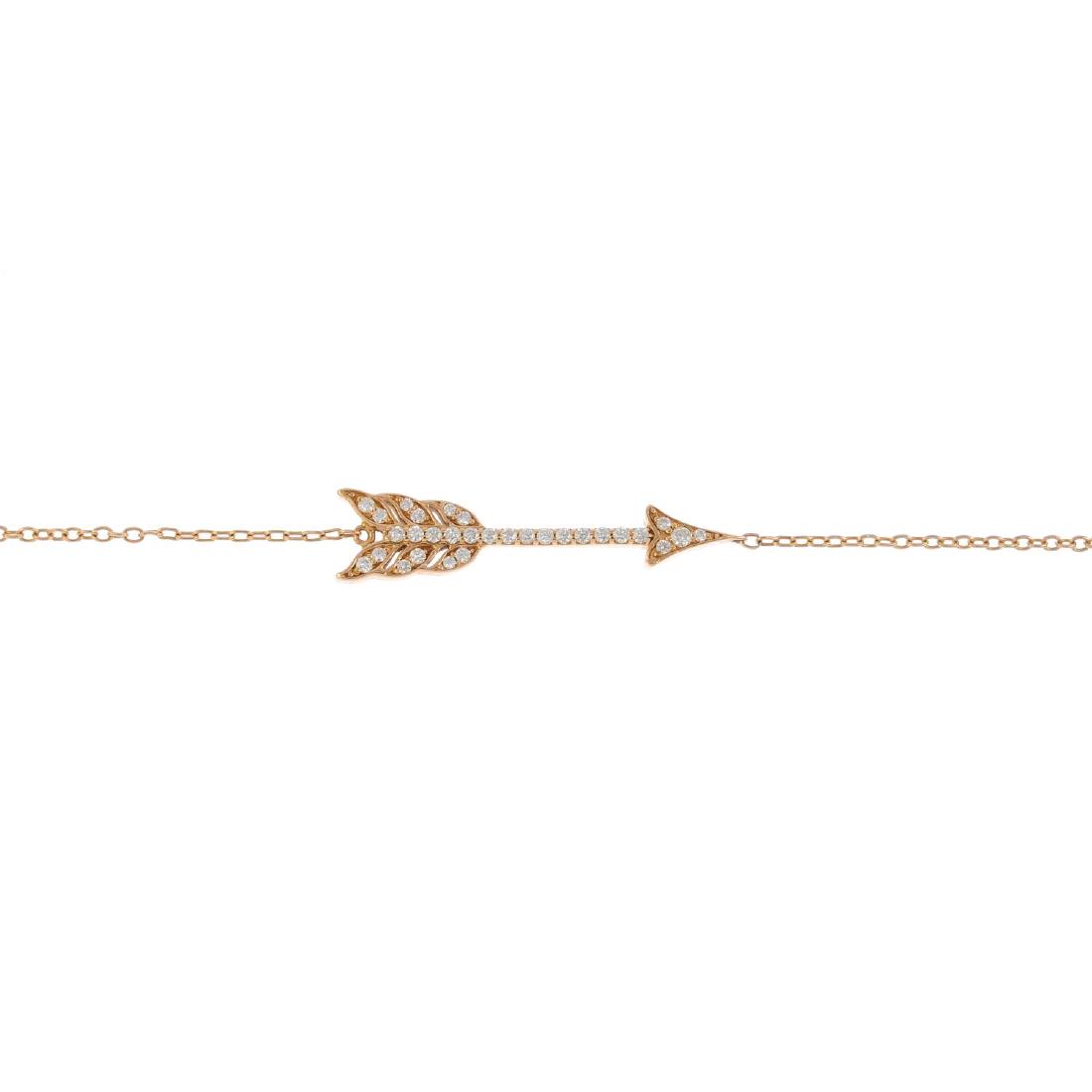 TIFFANY & CO. an 18ct gold diamond 'Arrow' bracelet.