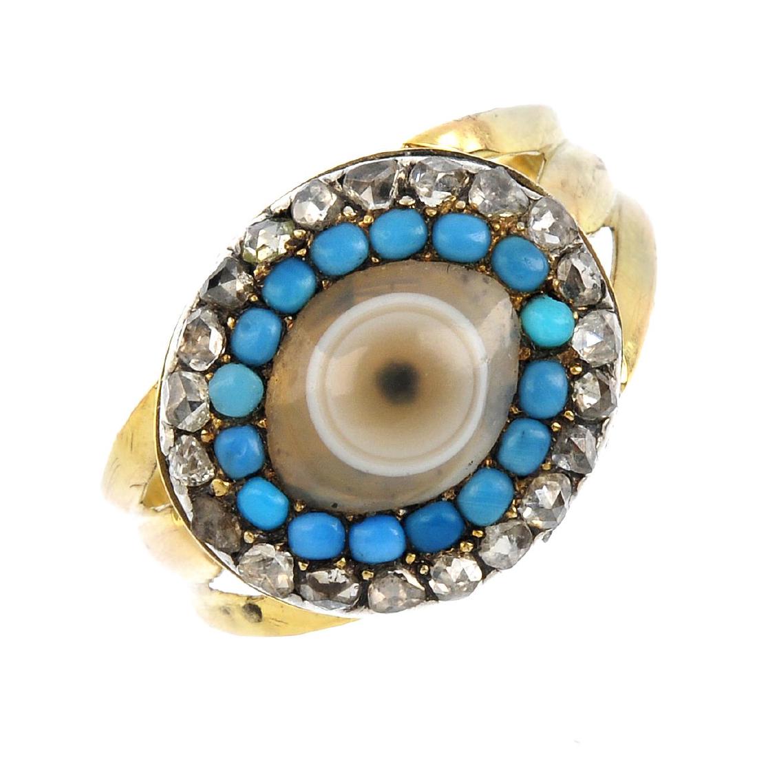 A late Georgian agate 'Evil Eye' and gem-set ring. The: A late Georgian agate 'Evil Eye' and gem-set ring. The marquise-shape banded agate, with circular turquoise cabochon and rose-cut diamond surrounds and replacement band. Ring size K. Weight 3.4gms.