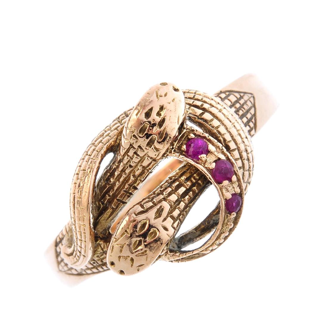A ruby snake ring. Designed as two intertwined textured (1 of 3)