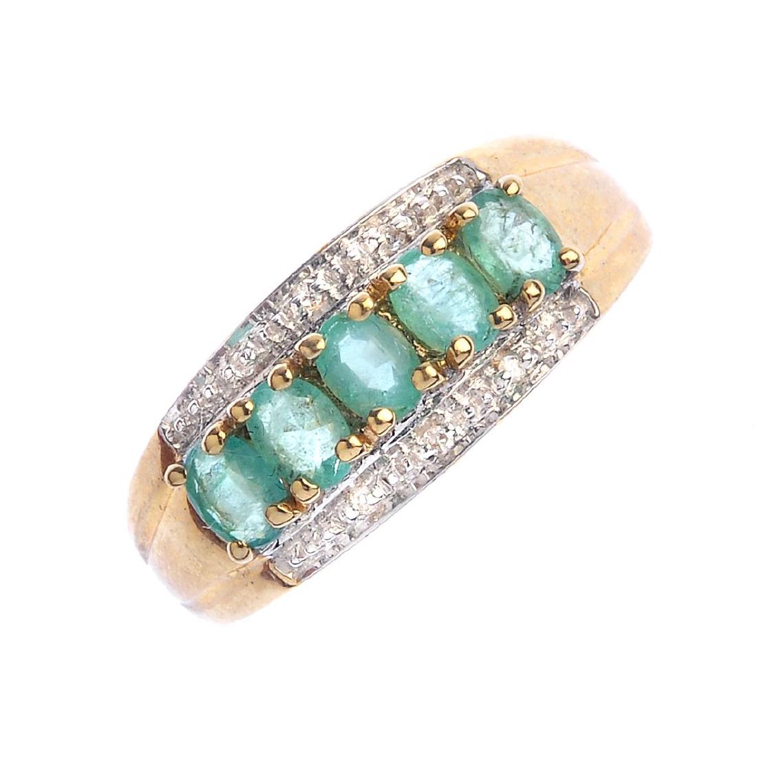 A 9ct gold emerald and diamond dress ring. The (1 of 3)