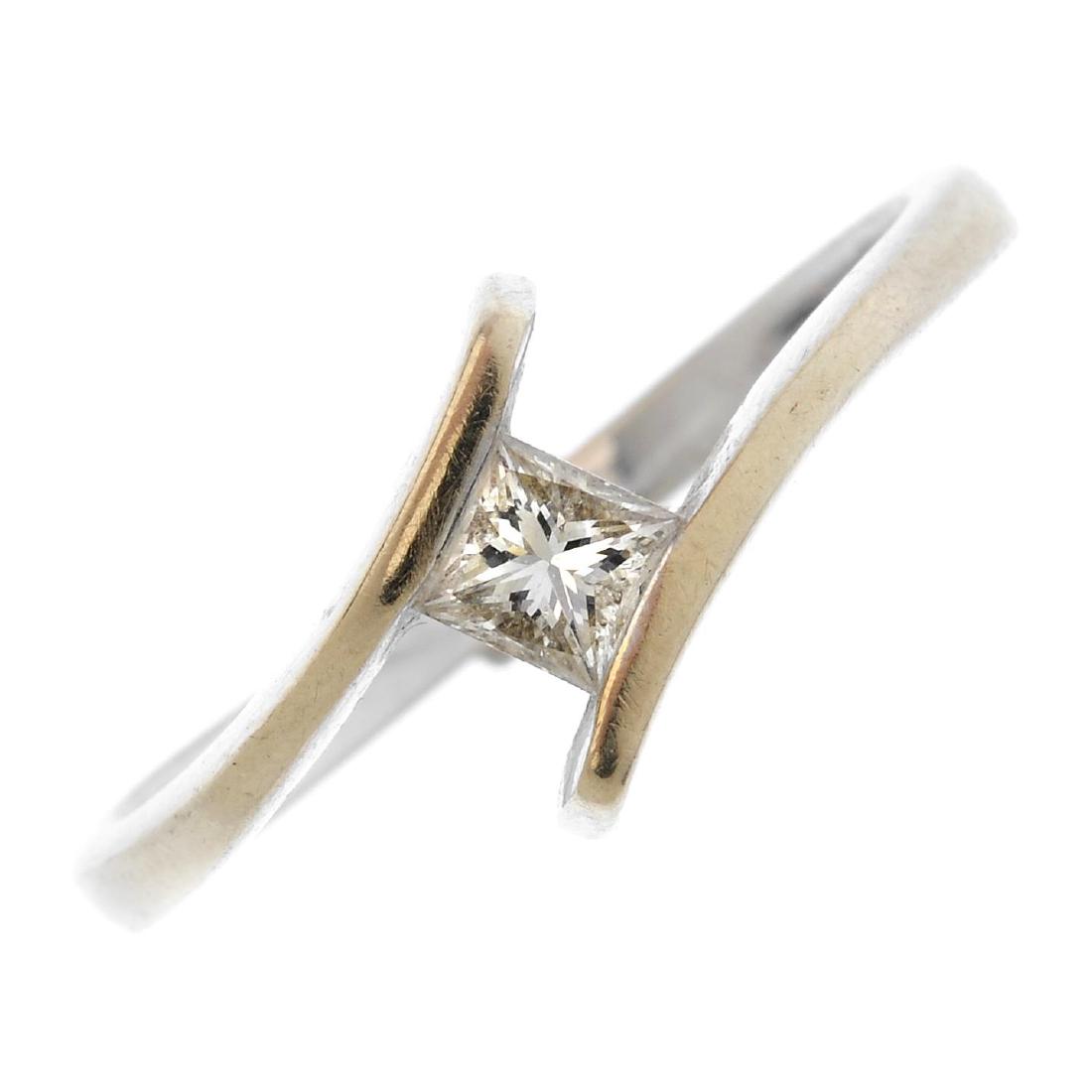 A diamond crossover ring. The square-shape diamond, (1 of 3)