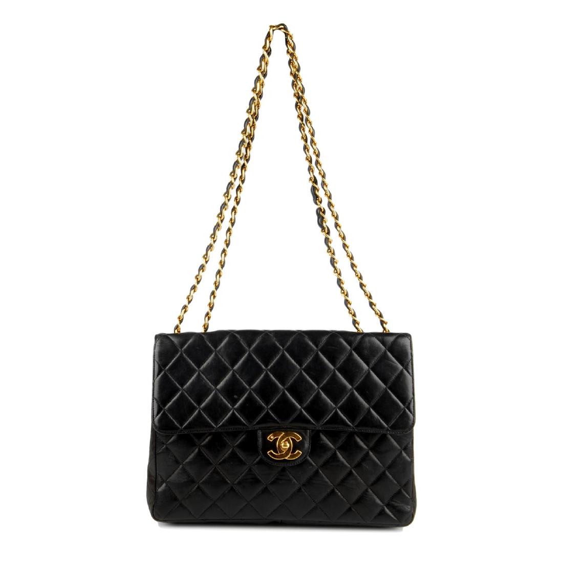 CHANEL - a Jumbo Classic Flap handbag. Featuring (1 of 4)