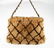 CHANEL - a fur handbag. Designed with a light brown - 4
