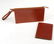 HERMÈS - a leather pouch and wallet. Both crafted from - 4