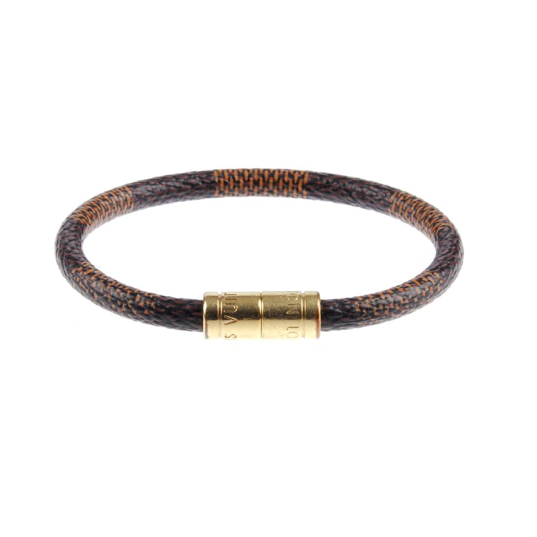 LOUIS VUITTON - a Damier Keep It bracelet. Featuring a (1 of 2)